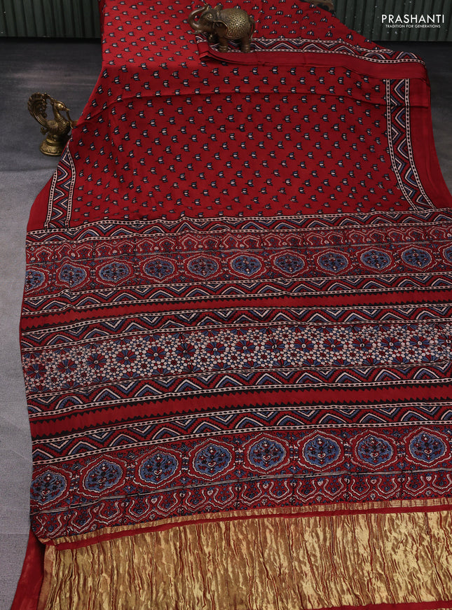 Modal silk saree maroon and pastel blue with allover ajrak butta prints and zari woven pallu