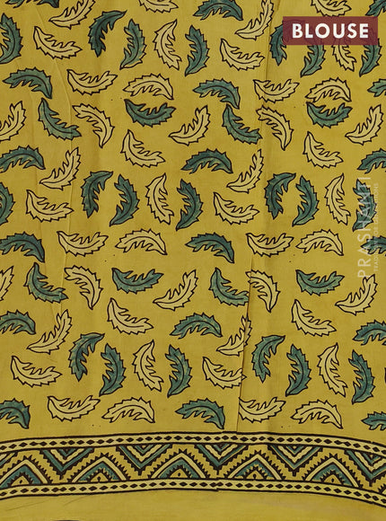 Modal silk saree yellow with allover ajrak butta prints and zari woven pallu
