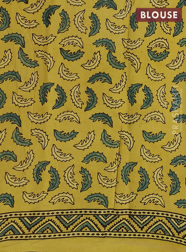 Modal silk saree yellow with allover ajrak butta prints and zari woven pallu