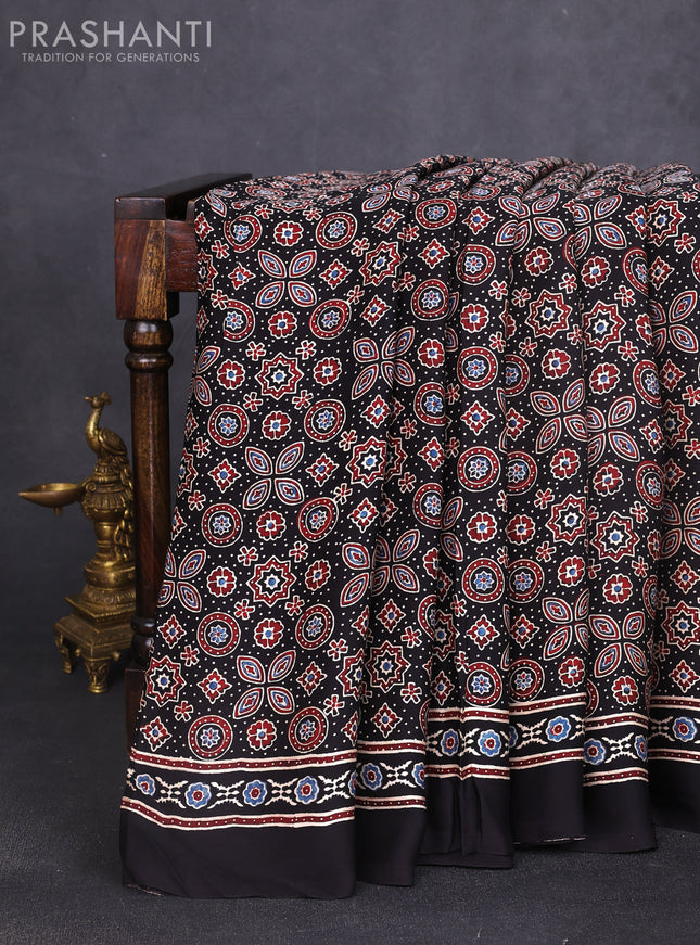 Modal silk saree black and maroon with allover ajrak prints and zari woven pallu