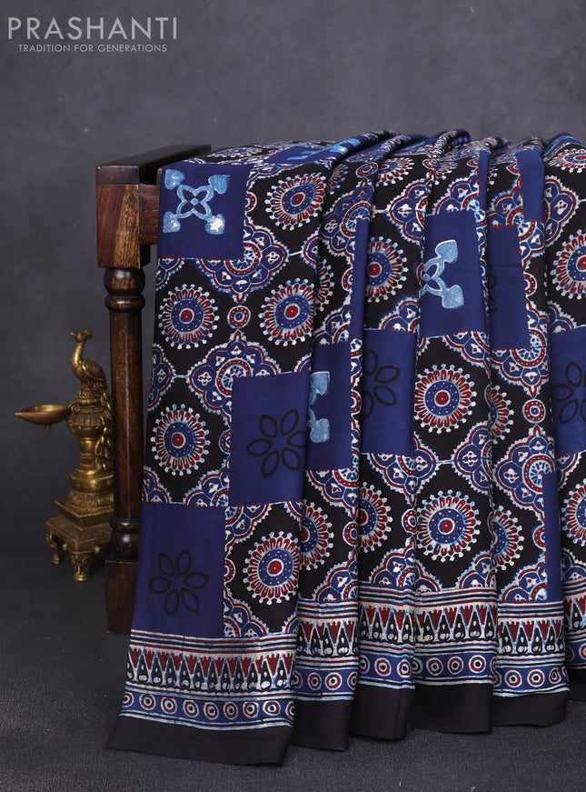 Modal silk saree indigo blue and black with allover ajrak prints and zari woven pallu