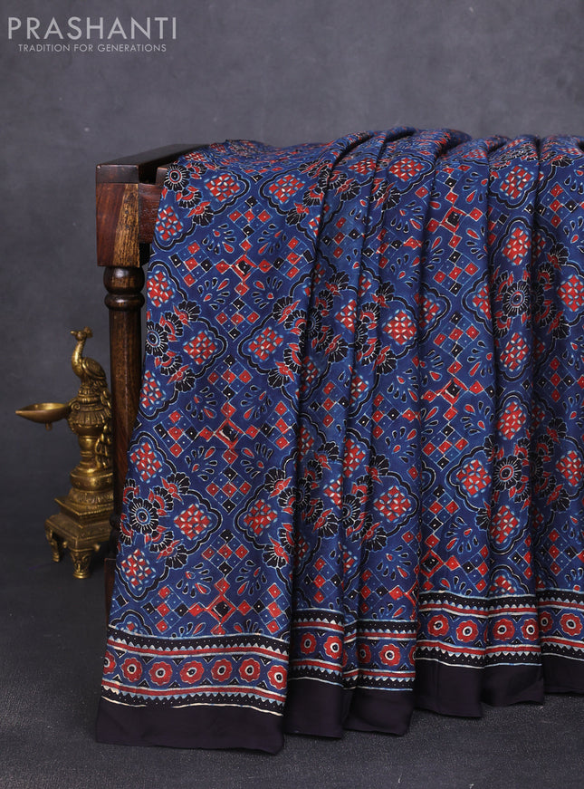 Modal silk saree indigo blue and black with allover ajrak prints and zari woven pallu