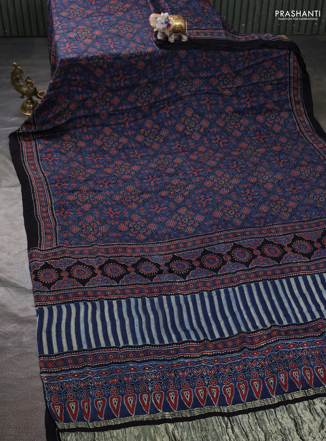 Modal silk saree indigo blue and black with allover ajrak prints and zari woven pallu