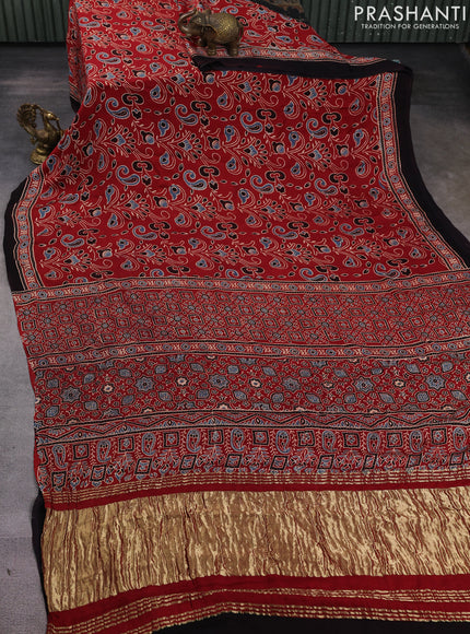 Modal silk saree maroon and black with allover ajrak prints and zari woven pallu