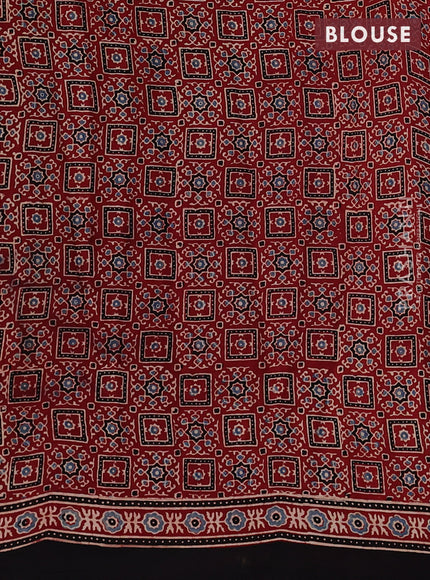 Modal silk saree maroon and black with allover ajrak prints and zari woven pallu