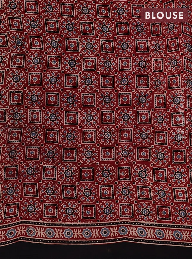 Modal silk saree maroon and black with allover ajrak prints and zari woven pallu