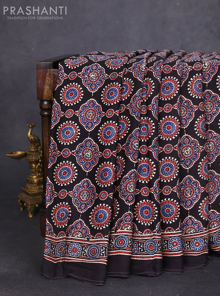 Modal silk saree black with allover ajrak prints and zari woven pallu
