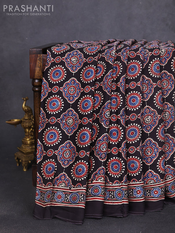 Modal silk saree black with allover ajrak prints and zari woven pallu