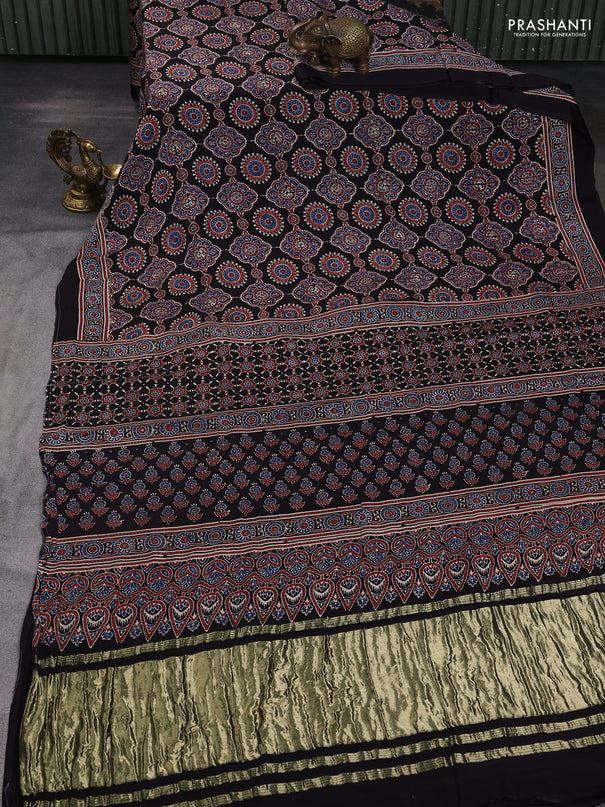 Modal silk saree black with allover ajrak prints and zari woven pallu