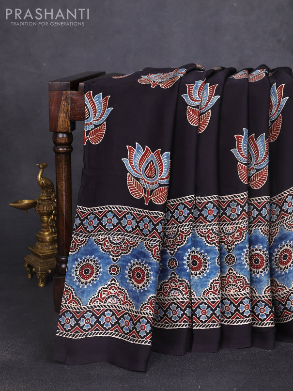 Modal silk saree black and indigo blue with allover ajrak prints and zari woven pallu