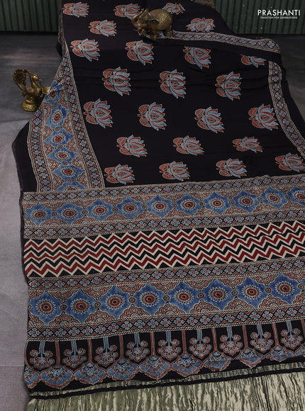 Modal silk saree black and indigo blue with allover ajrak prints and zari woven pallu