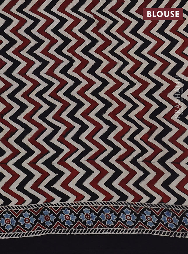 Modal silk saree black and indigo blue with allover ajrak prints and zari woven pallu