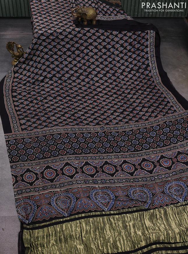 Modal silk saree black with allover ajrak prints and zari woven pallu