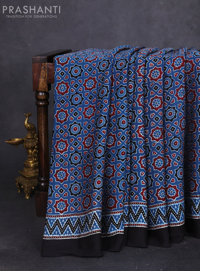Modal silk saree indigo blue and black with allover ajrak prints and zari woven pallu