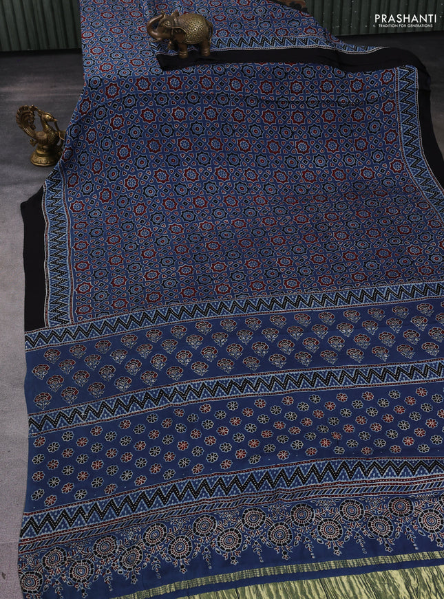 Modal silk saree indigo blue and black with allover ajrak prints and zari woven pallu