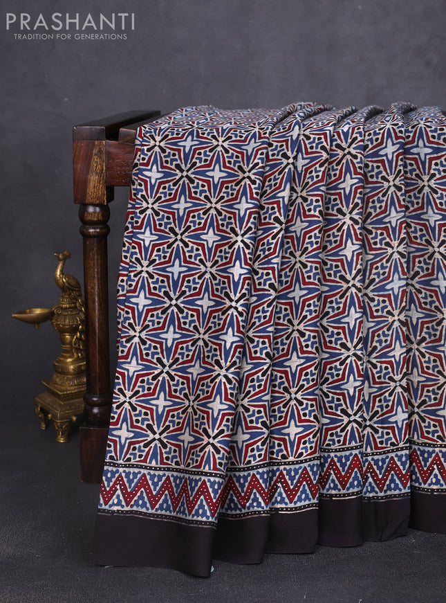 Modal silk saree black with allover ajrak prints and zari woven pallu