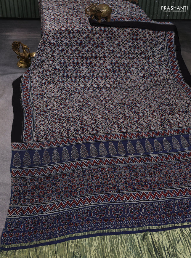 Modal silk saree black with allover ajrak prints and zari woven pallu