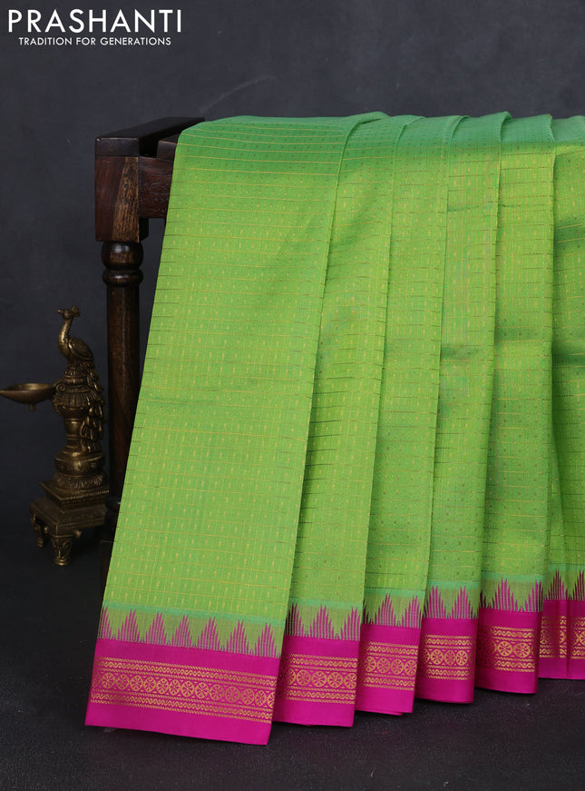 Kuppadam silk cotton saree light green and pink with allover zari checks & lakshadeepam weaves and temple design zari woven border