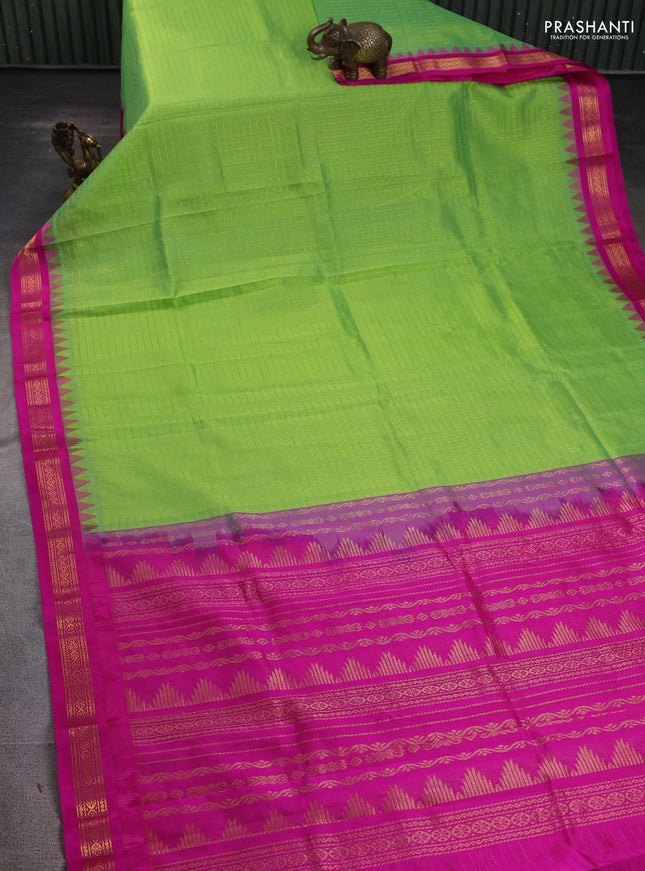 Kuppadam silk cotton saree light green and pink with allover zari checks & lakshadeepam weaves and temple design zari woven border