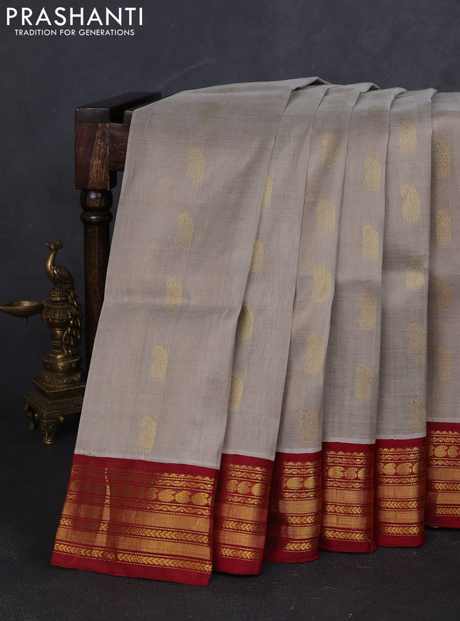 Kuppadam silk cotton saree grey and maroon with paisley zari woven buttas and zari woven korvai border