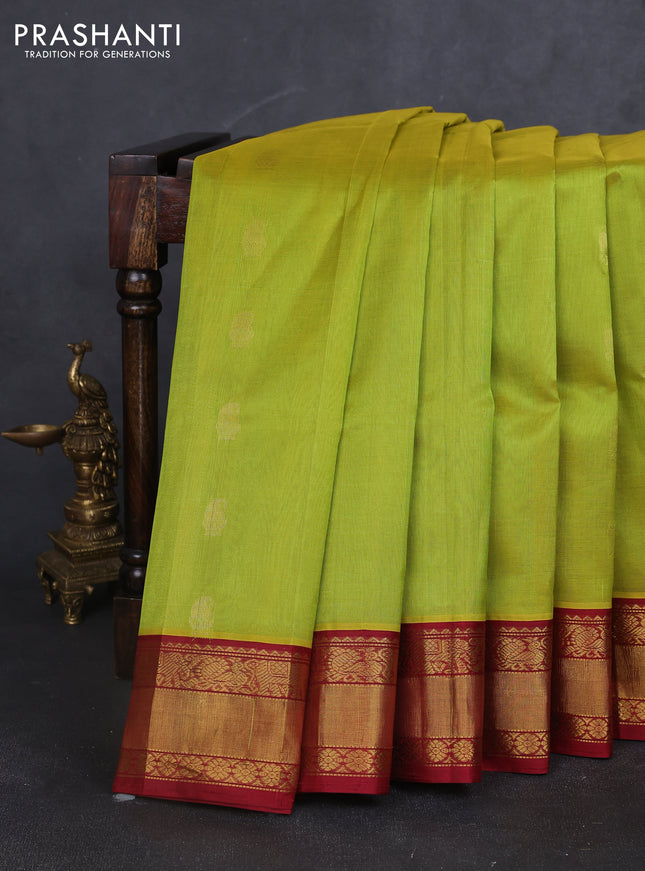 Kuppadam silk cotton saree light green and maroon with annam zari woven buttas and zari woven korvai border