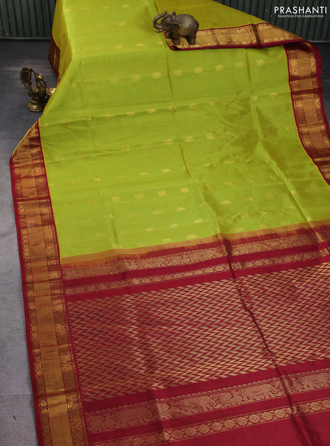 Kuppadam silk cotton saree light green and maroon with annam zari woven buttas and zari woven korvai border