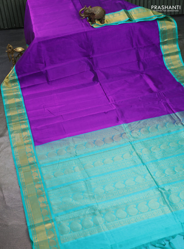 Kuppadam silk cotton saree purple and teal blue with plain body and paisley zari woven border