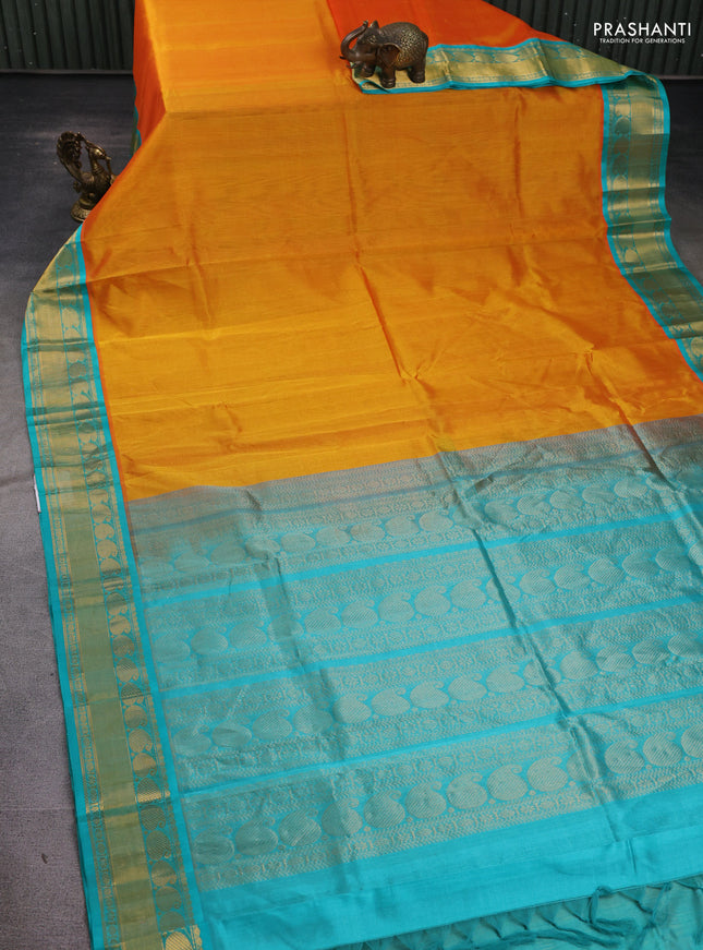 Kuppadam silk cotton saree mango yellow and teal blue with plain body and paisley zari woven border