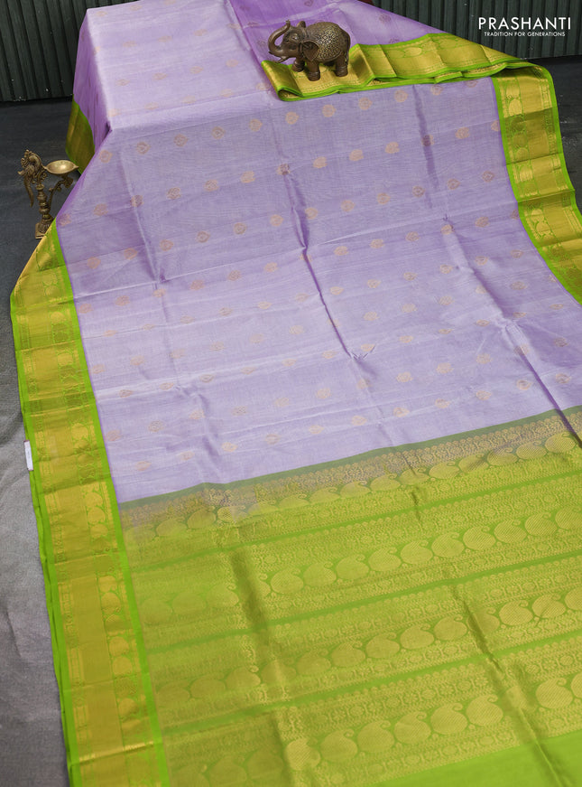 Kuppadam silk cotton saree pastel lavender and fluorescent green with annam zari woven buttas and paisley zari woven border
