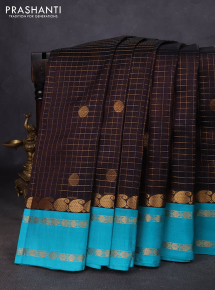 Kuppadam silk cotton saree black and teal blue with allover zari checks & buttas and paisley zari woven border