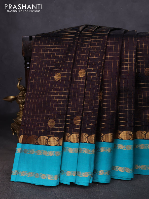 Kuppadam silk cotton saree black and teal blue with allover zari checks & buttas and paisley zari woven border