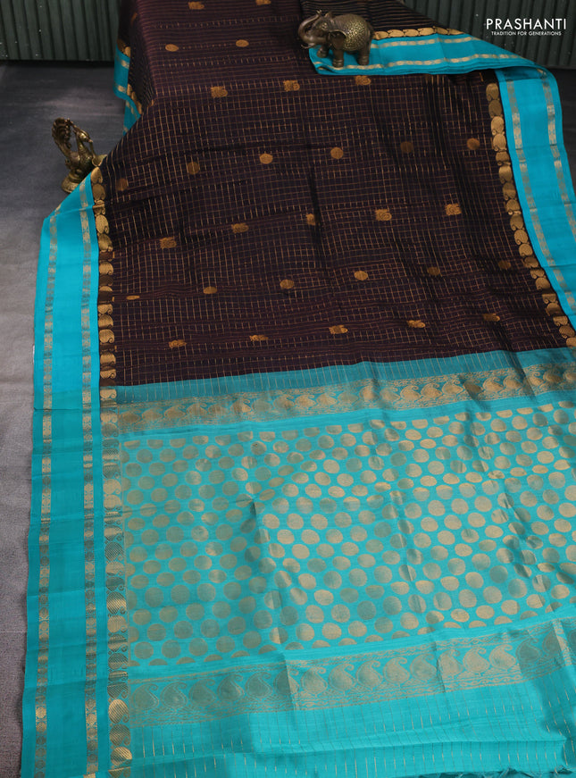 Kuppadam silk cotton saree black and teal blue with allover zari checks & buttas and paisley zari woven border