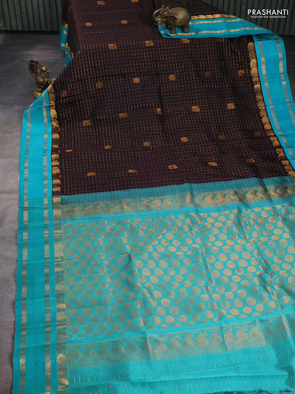 Kuppadam silk cotton saree black and teal blue with allover zari checks & buttas and paisley zari woven border