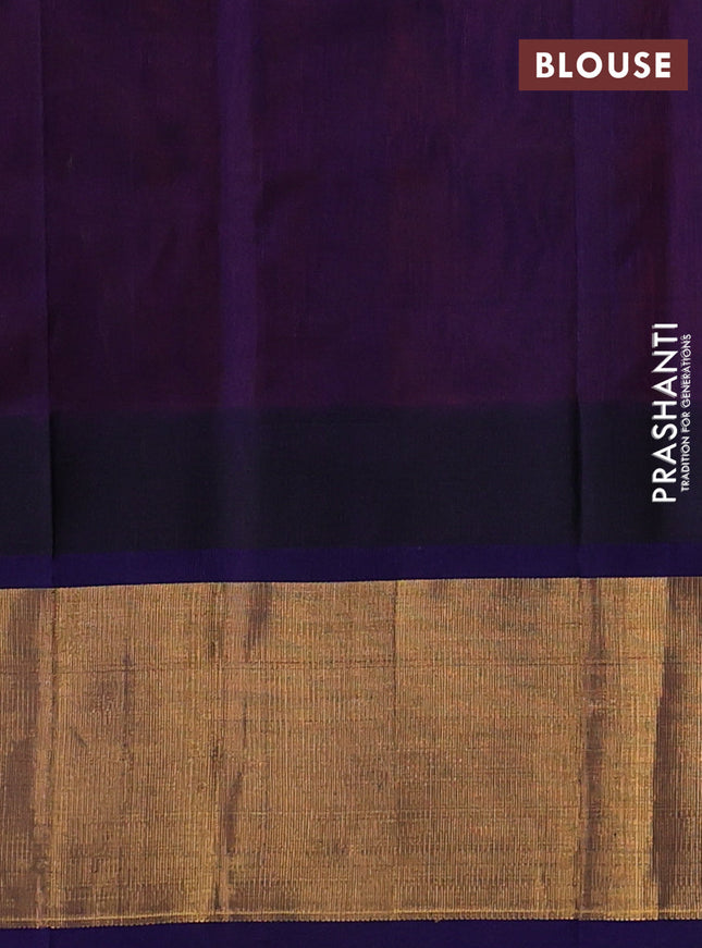 Kuppadam silk cotton saree dual shade of pinkish orange and navy blue with plain body and temple design zari woven border