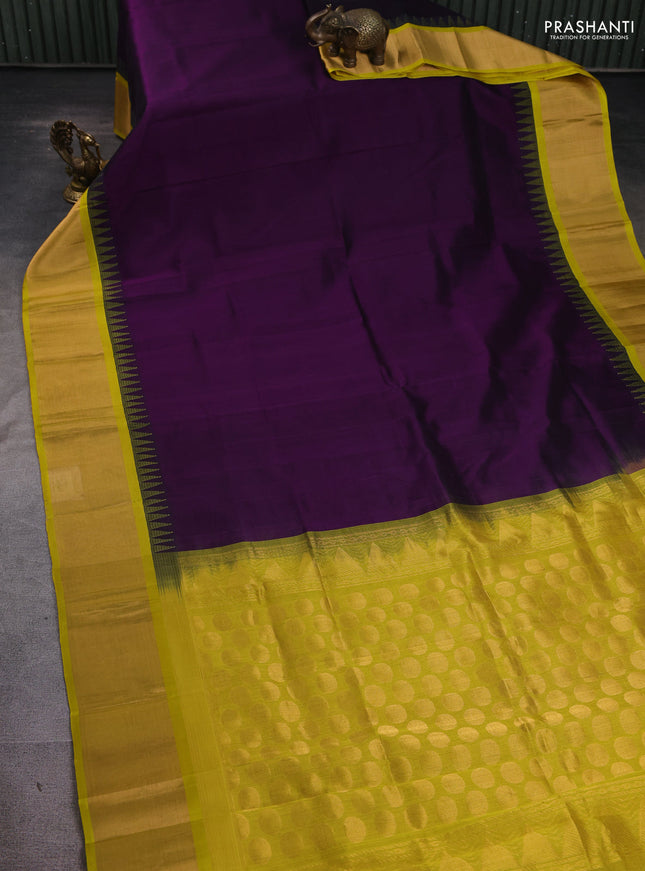 Kuppadam silk cotton saree violet and lime yellow with plain body and temple design zari woven border