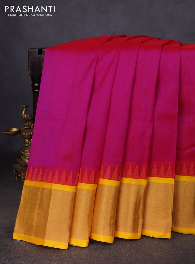 Kuppadam silk cotton saree pink and yellow with plain body and temple design zari woven border