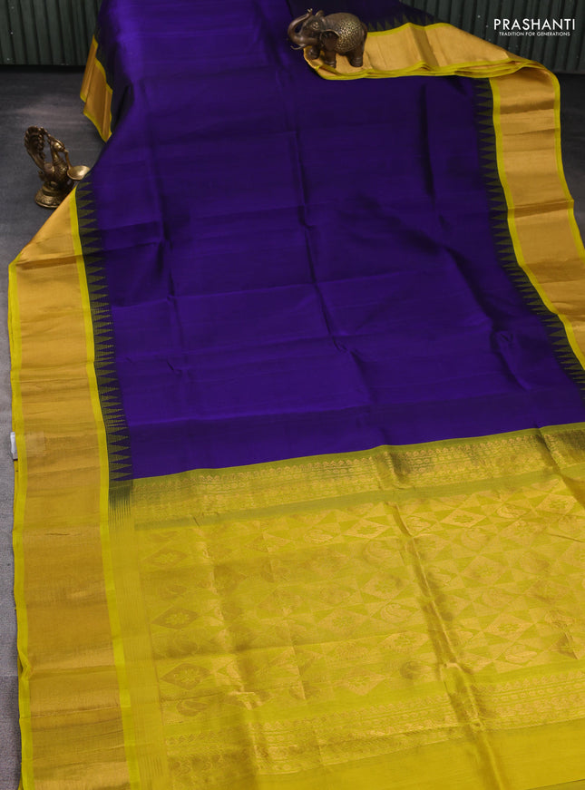 Kuppadam silk cotton saree blue and lime yellow with plain body and temple design zari woven border