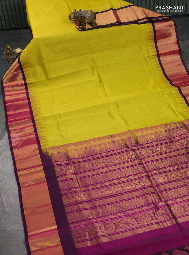 Kuppadam silk cotton saree lime yellow and deep jamun with plain body and temple design zari woven border