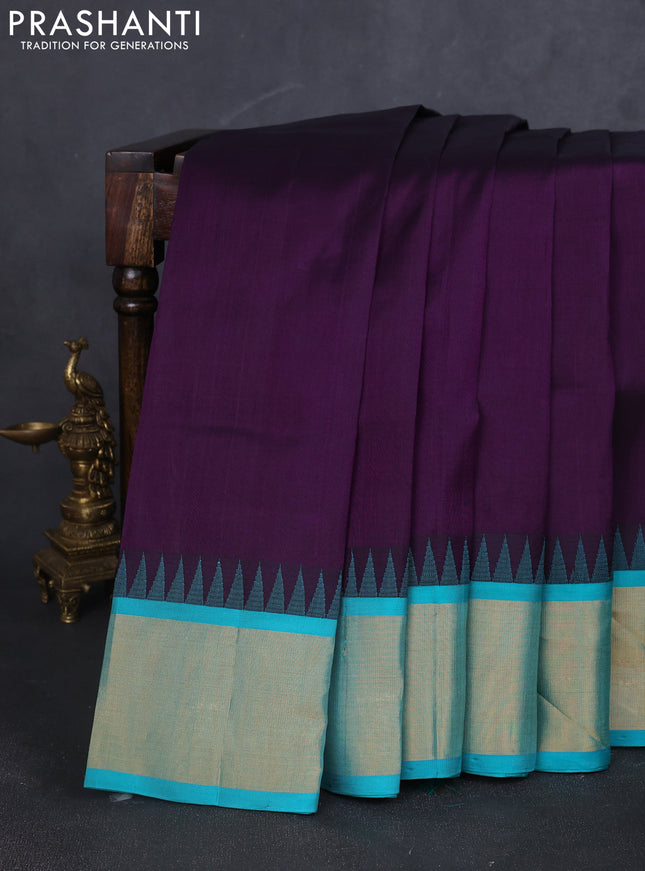 Kuppadam silk cotton saree deep violet and teal blue with plain body and temple design zari woven border