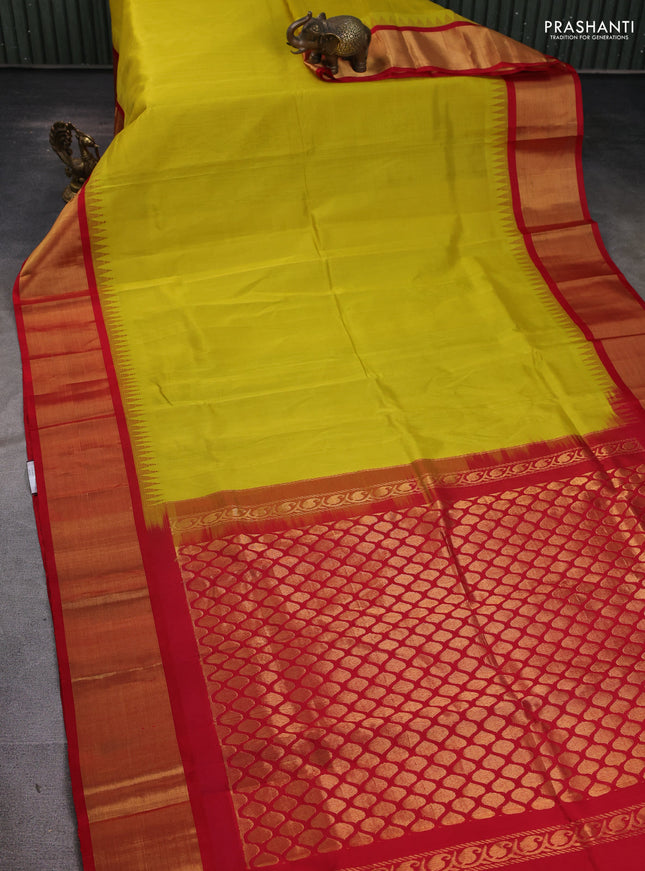 Kuppadam silk cotton saree lime yellow and red with plain body and temple design zari woven border