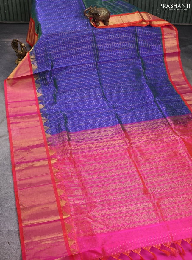 Kuppadam silk cotton saree navy blue and orange with allover zari checks & lakshadeepam weaves and temple design long zari border
