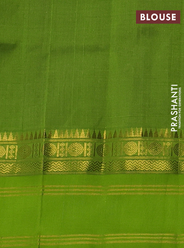 Kuppadam silk cotton saree purple and fluorescent green with allover zari checked pattern and zari woven border