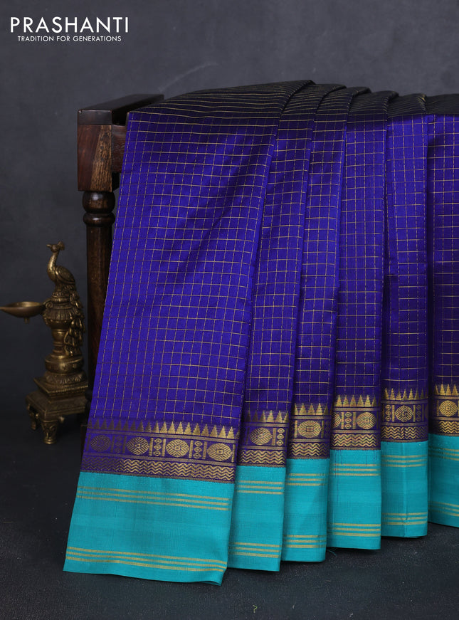 Kuppadam silk cotton saree blue and teal blue with allover zari checked pattern and zari woven border