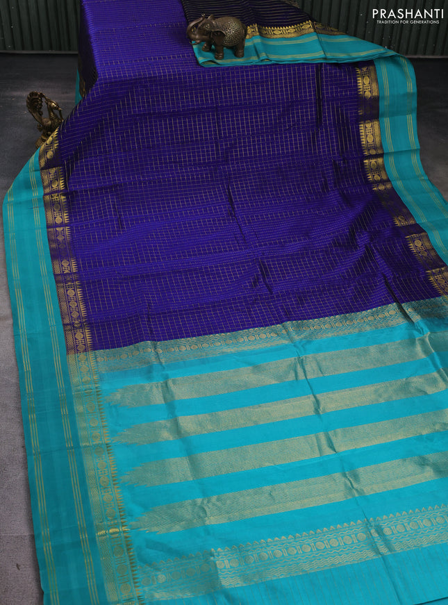 Kuppadam silk cotton saree blue and teal blue with allover zari checked pattern and zari woven border