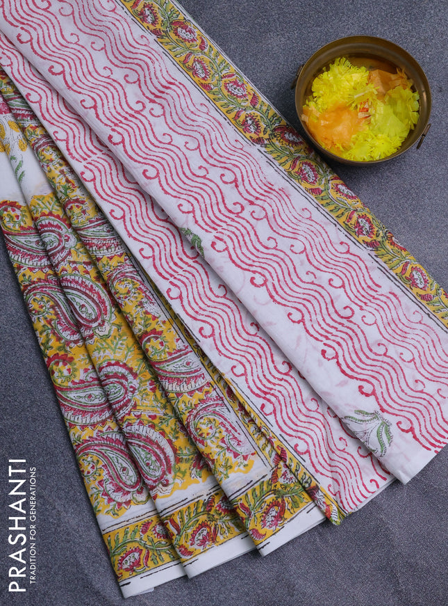 Jaipur cotton saree yellow and off white with allover paisely prints and printed border