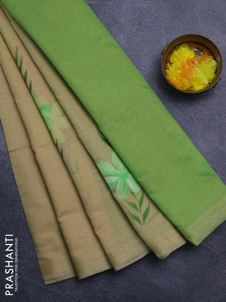Linen cotton saree sandal and light green with floral hand paint prints and zari woven border