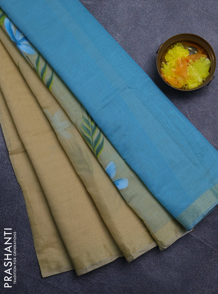 Linen cotton saree sandal and teal blue with floral hand paint prints and zari woven border