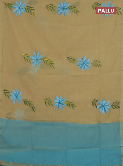 Linen cotton saree sandal and teal blue with floral hand paint prints and zari woven border