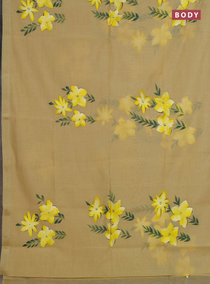 Linen cotton saree sandal and yellow with floral hand paint prints and zari woven border