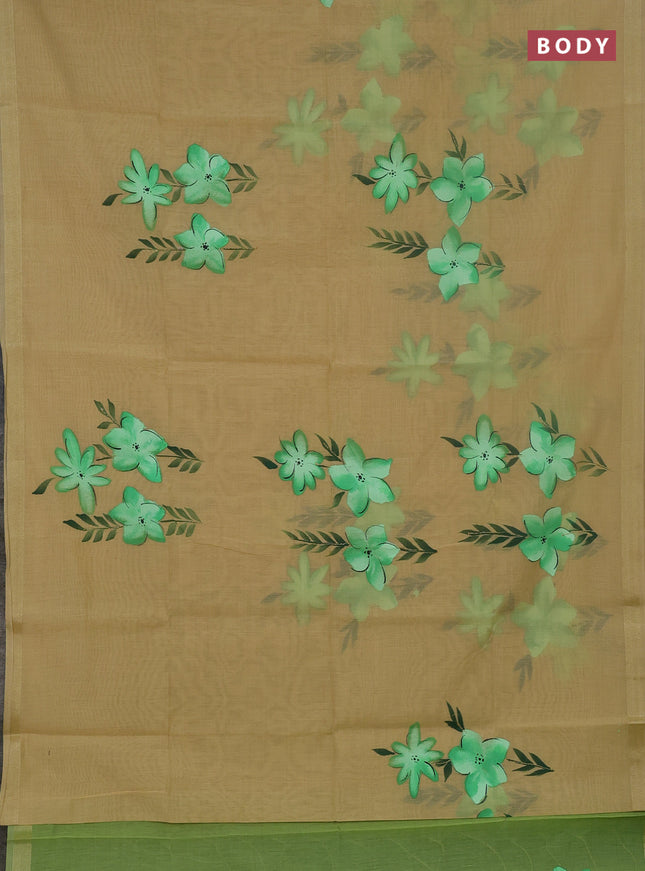 Linen cotton saree sandal and light green with floral hand paint prints and zari woven border